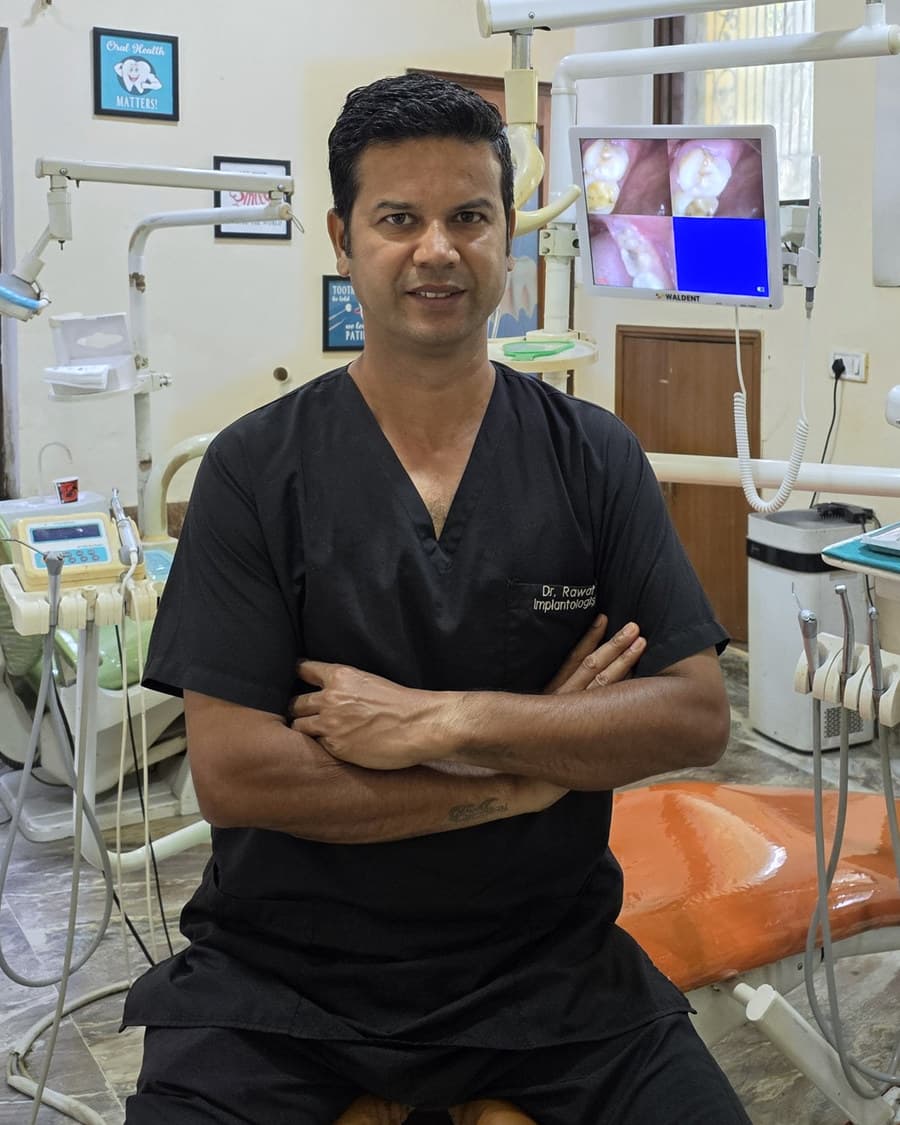 Dr. Bhupendra Singh Rawat in the treatment room at Health Factor Dental Clinic